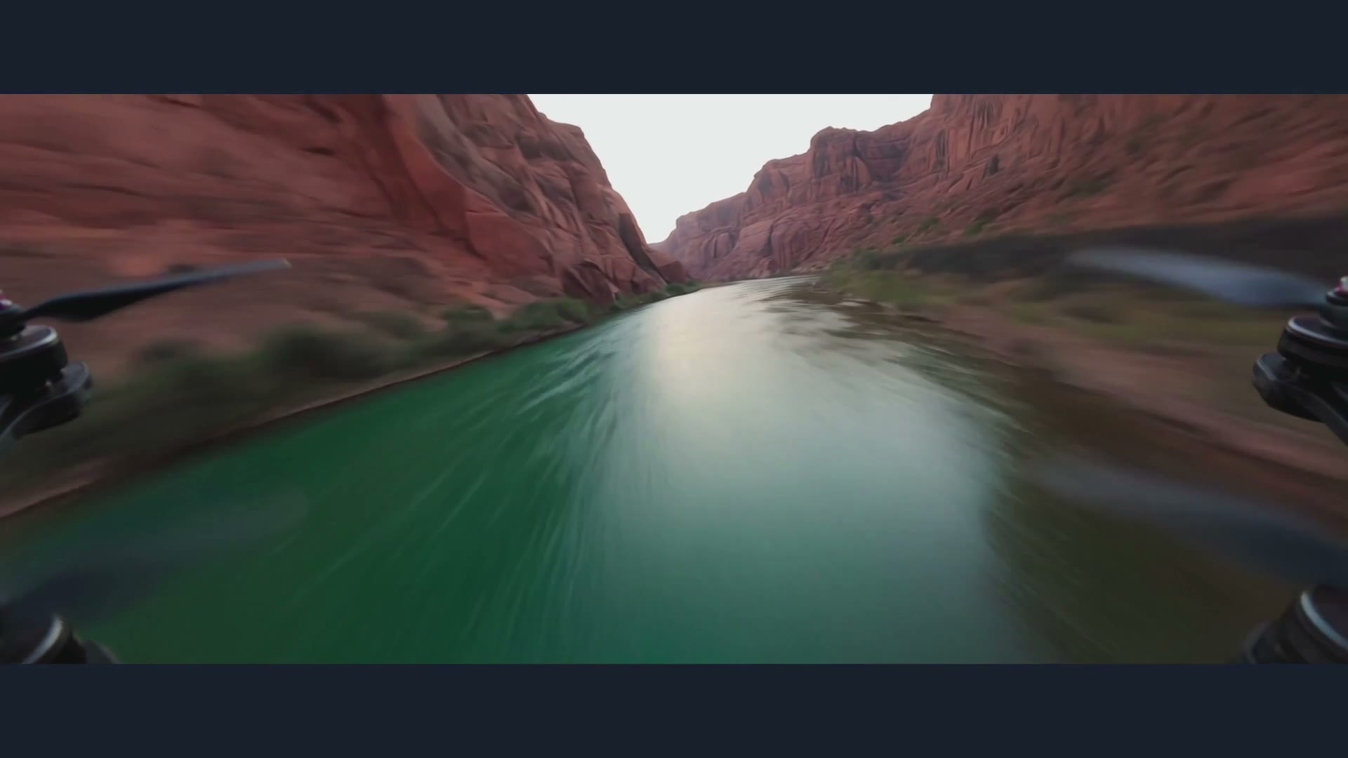 Frame from a 30-second Kling 4.0 FPV drone shot over a canyon river